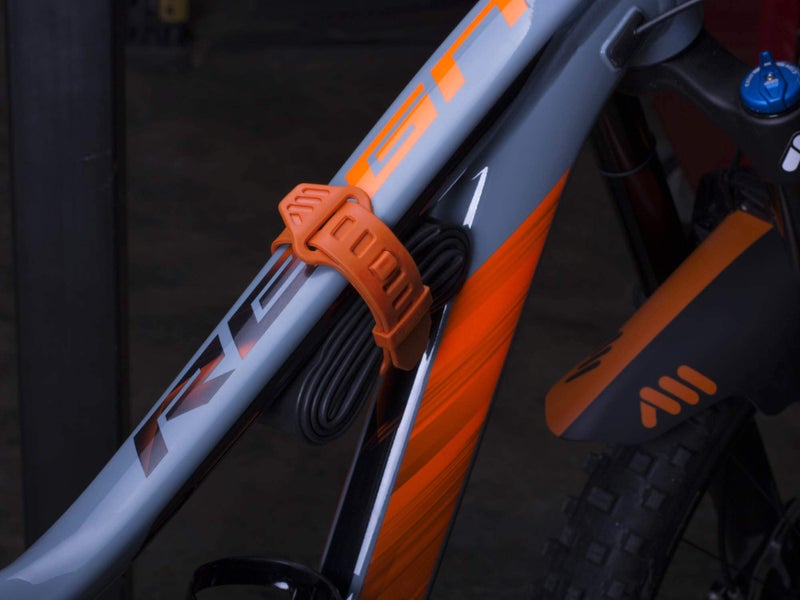 All Mountain Style MTB Tube Strap â€“ Lightweight, No-Velcro Bike Frame Strap for CO2, Tire Levers & Tube â€“ Universal Fit, Weather-Resistant TPE Material - Orange Color - Image 4